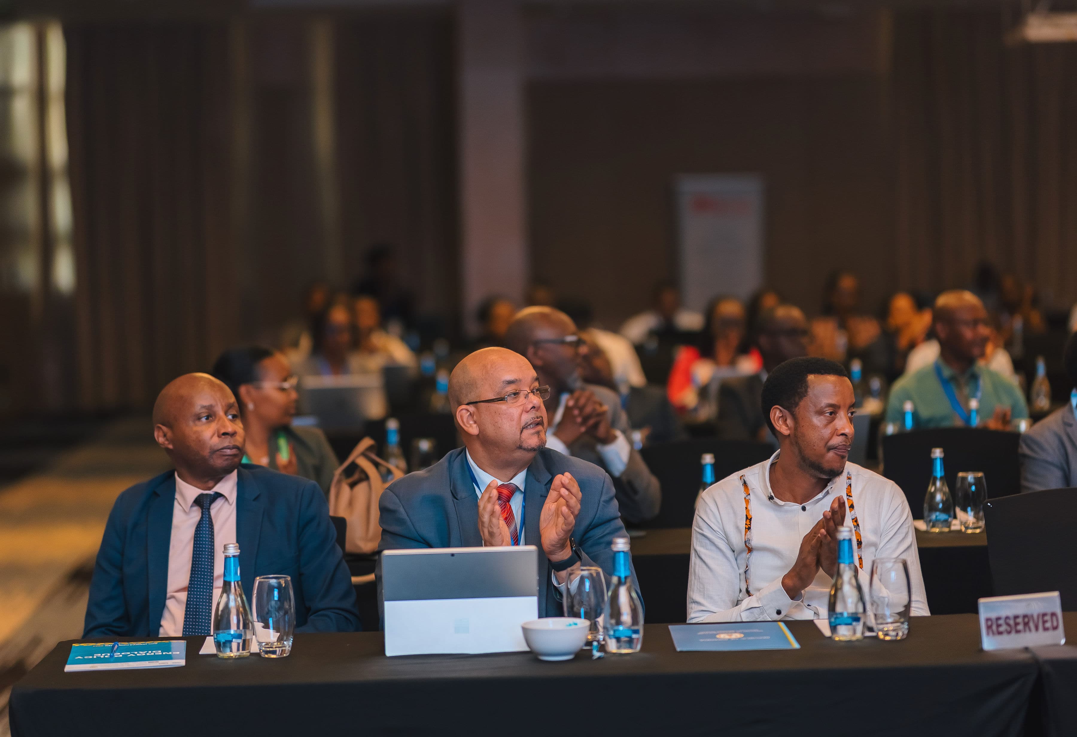 Conference speaker taking audience questions in a Q&A session